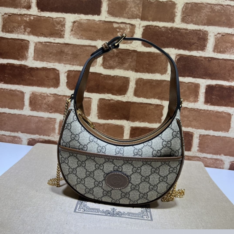 G*u*i top handle bags